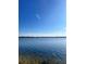 Expansive lake view with crystal-clear water and a tranquil scene at 1234 Lynwood Ave, Apopka, FL 32703