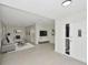 Spacious living room with sleek decor, comfortable seating, and ample natural light at 1234 Lynwood Ave, Apopka, FL 32703