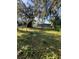 This property features a spacious backyard with a mature tree, and ample space for entertaining at 1505 S Westmoreland Dr, Orlando, FL 32805