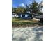 Charming single-story home with a well-maintained lawn and mature shade tree at 1505 S Westmoreland Dr, Orlando, FL 32805