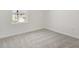Bedroom featuring a window, carpet, and neutral walls at 1698 Sugarbelle Cir, Mascotte, FL 34753