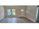 Bright living room with hardwood floors and neutral walls at 6817 Sw 131St Pl, Ocala, FL 34473