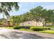 Solita community entrance with lush landscaping at 753 Largo Pass, Poinciana, FL 34759