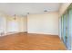 Bright living room features wood-look floors and sliding glass doors to the exterior at 753 Largo Pass, Poinciana, FL 34759