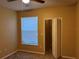 Bedroom with closet and window at 8830 Dunes Ct # 12 207, Kissimmee, FL 34747