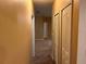 Hallway with neutral walls and carpet flooring at 8830 Dunes Ct # 12 207, Kissimmee, FL 34747