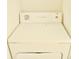 Laundry room with a white heavy duty extra large capacity dryer at 8830 Dunes Ct # 12 207, Kissimmee, FL 34747