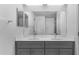 Modern bathroom with double vanity and gray cabinets at 314 Dagama Ct, Kissimmee, FL 34758