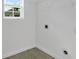 Walk-in closet with window, shelf, and hookups at 314 Dagama Ct, Kissimmee, FL 34758