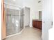 Bathroom with shower and granite countertop vanity at 663 Irvine Ranch Rd, Poinciana, FL 34759