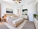 Bright bedroom with a king-size bed and plenty of natural light at 663 Irvine Ranch Rd, Poinciana, FL 34759