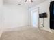 Bright bedroom with access to another room at 663 Irvine Ranch Rd, Poinciana, FL 34759