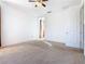 Spacious bedroom with carpet flooring and ceiling fan at 663 Irvine Ranch Rd, Poinciana, FL 34759