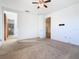 Simple bedroom with carpet flooring and ceiling fan at 663 Irvine Ranch Rd, Poinciana, FL 34759