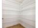 Walk-in pantry with wire shelving; offers ample storage space at 663 Irvine Ranch Rd, Poinciana, FL 34759