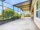 Spacious screened patio, perfect for outdoor relaxation at 663 Irvine Ranch Rd, Poinciana, FL 34759