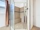 Walk-in shower with tiled walls and seat at 663 Irvine Ranch Rd, Poinciana, FL 34759