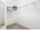 Walk-in closet with wire shelving and mirror at 663 Irvine Ranch Rd, Poinciana, FL 34759