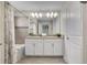 Double vanity bathroom with a bathtub at 890 Pebble Beach Dr, Davenport, FL 33896