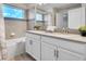 Double vanity bathroom with a bathtub at 890 Pebble Beach Dr, Davenport, FL 33896