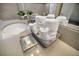Bathroom vanity with rolled towels and soap dispenser at 890 Pebble Beach Dr, Davenport, FL 33896