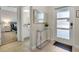 Hallway view of bedroom and bathroom, with contemporary decor at 890 Pebble Beach Dr, Davenport, FL 33896