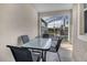 Outdoor patio with table and chairs at 890 Pebble Beach Dr, Davenport, FL 33896