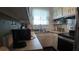 A kitchen with essential appliances at 1600 W Lake Parker Dr # B23, Lakeland, FL 33805
