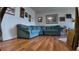 Comfortable living room with a blue sofa at 1600 W Lake Parker Dr # B23, Lakeland, FL 33805