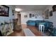 Inviting living room featuring a comfortable blue sofa and elegant decor at 1600 W Lake Parker Dr # B23, Lakeland, FL 33805