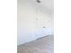 Bedroom with gray wood-look flooring and double doors at 195 Casavista Dr, Kissimmee, FL 34759
