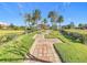 Beautiful community with lush landscaping, brick walkways, and a charming gazebo at 195 Casavista Dr, Kissimmee, FL 34759