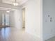 Open foyer area with tray ceilings and tile flooring at 195 Casavista Dr, Kissimmee, FL 34759