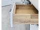 This kitchen drawer features light wood construction with dove tail joints and a sleek stainless steel pull at 195 Casavista Dr, Kissimmee, FL 34759