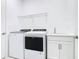 Bright laundry room with modern washer, dryer, and utility sink at 195 Casavista Dr, Kissimmee, FL 34759