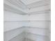 A spacious walk-in pantry features white wire shelving for optimal storage at 195 Casavista Dr, Kissimmee, FL 34759