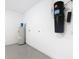 Utility room with water heater and vacuum system at 195 Casavista Dr, Kissimmee, FL 34759