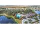Community pool, clubhouse, playground, and surrounding landscape at 1940 Banner Ln, St Cloud, FL 34769