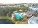 Community pool with clubhouse and playground at 1940 Banner Ln, St Cloud, FL 34769