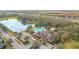 Community pool, clubhouse, and surrounding landscape from above at 1940 Banner Ln, Saint Cloud, FL 34769