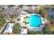 Community pool and clubhouse with playground nearby at 1940 Banner Ln, St Cloud, FL 34769