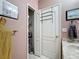 Small bathroom with linen closet and storage at 1940 Banner Ln, St Cloud, FL 34769