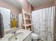 Bathroom with shower/tub combo and marble vanity at 1940 Banner Ln, Saint Cloud, FL 34769