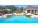 Relax by the community pool with adjacent playground at 1940 Banner Ln, Saint Cloud, FL 34769