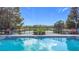 Enjoy resort-style pool with lake view at 1940 Banner Ln, St Cloud, FL 34769