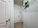 Clean hallway with neutral walls and tile floor at 1940 Banner Ln, St Cloud, FL 34769
