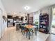Open kitchen with island, stainless steel appliances, and a breakfast nook at 1940 Banner Ln, St Cloud, FL 34769
