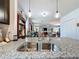 Modern kitchen with granite countertops and stainless steel appliances at 1940 Banner Ln, St Cloud, FL 34769