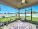 Cozy screened-in patio perfect for relaxing at 1940 Banner Ln, St Cloud, FL 34769