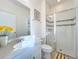 Clean bathroom featuring a single vanity, glass-enclosed shower, and modern fixtures and decor at 4191 Oaktree Drive, Davenport, FL 33837